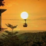 Cable car on the  mountain sunset background