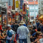 People shopping and eating in Chinatown - Singapore