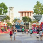 A variety of carnival game stands at Resorts World Sentosa. In the background is the entrance to Universal Studios Singapore.