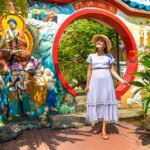 Woman traveler at Kek Lok Si Temple in Georgetown, Penang island, Malaysia